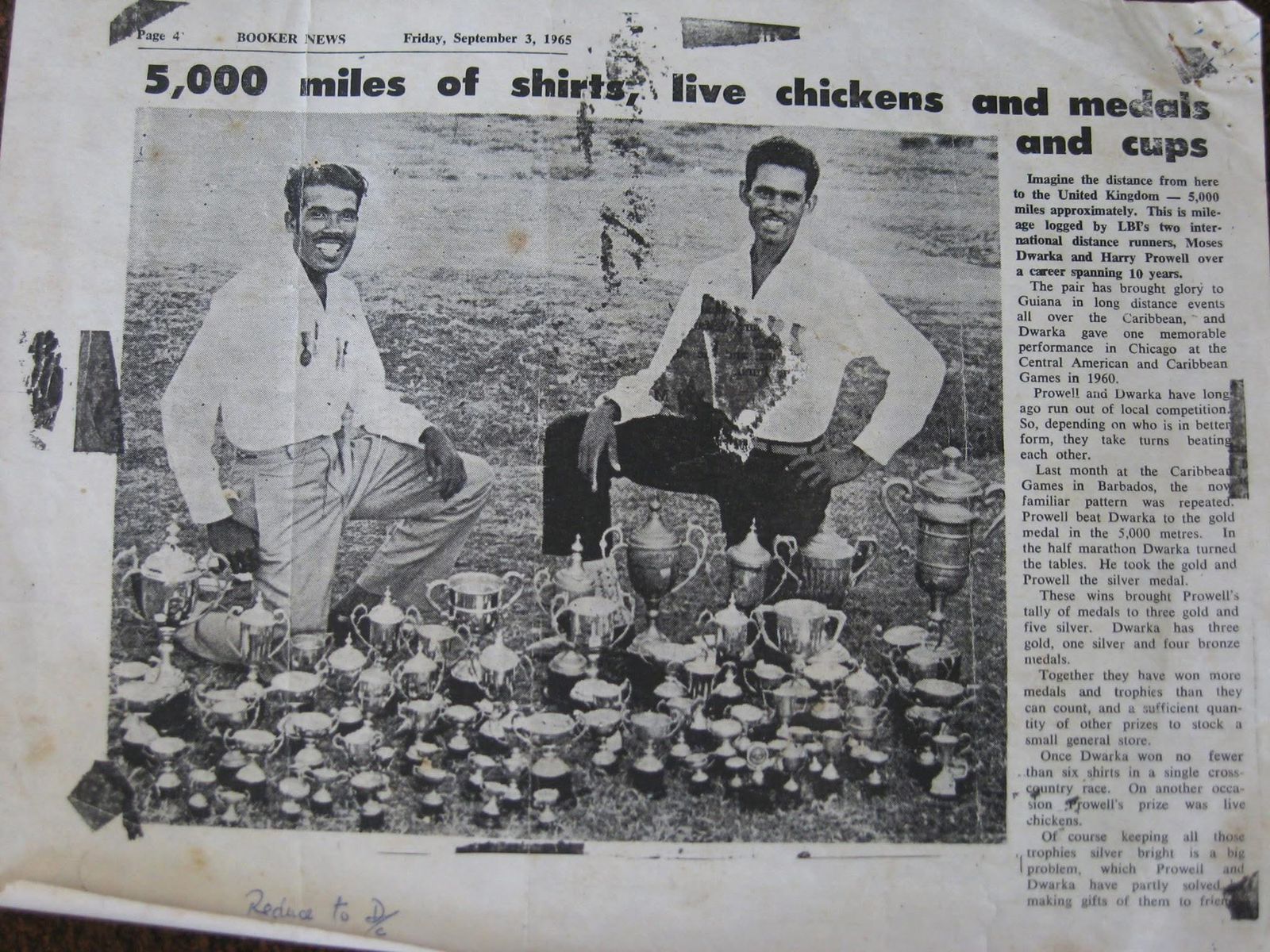 Moses Dwarka and Harry Prowell with their trophy collection, 1965 Booker News